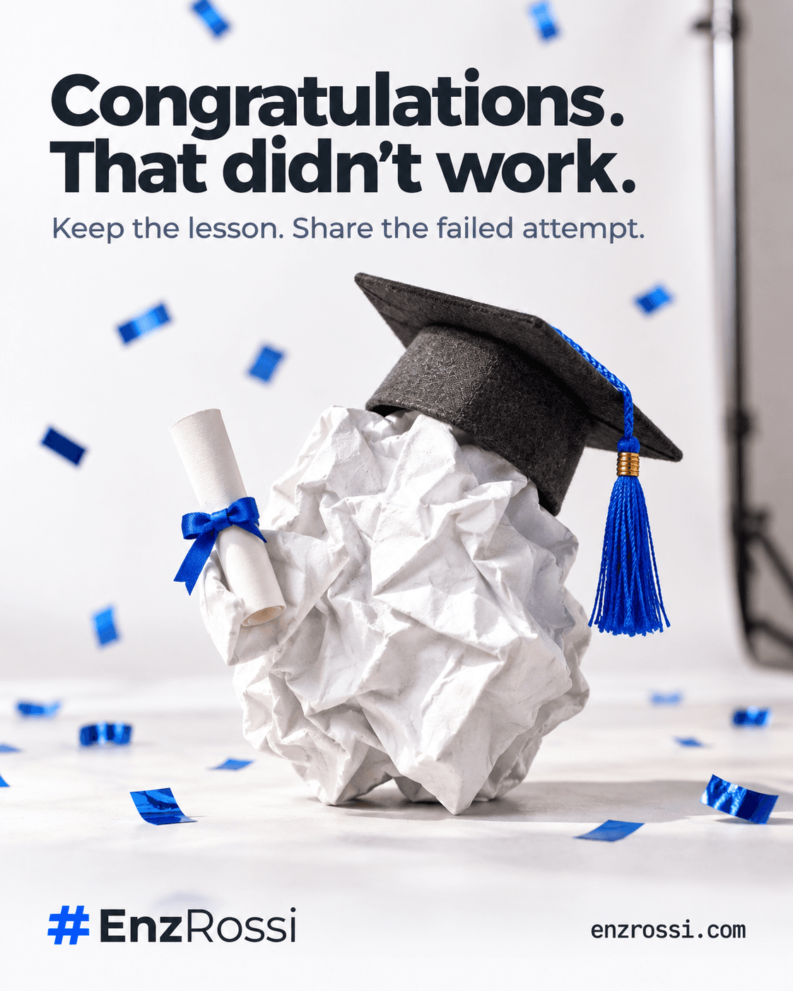 A crumpled piece of paper wears a graduation cap and holds a diploma amid scattered confetti. Headline: Congratulations. That didn't work. Tagline: Keep the lesson. Share the failed attempt.