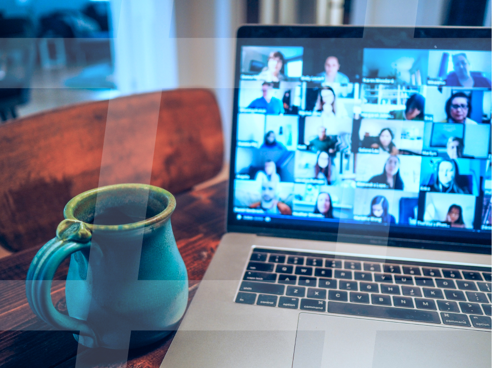 A laptop with many small video boxes showing people